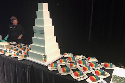 Fluffy Thoughts Cakes made each tier of the pyramid-style cake out of individual layers in each color of the rainbow for the Washington dessert reception.