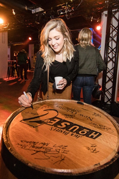 After listening to a presentation from a Jack Daniel's barrel master, guests were invited to leave their signatures on a barrel.