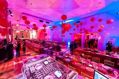 Red paper lanterns hung from the ceiling above the main entrance to the dinner and above the dance floor, a change from the use of drapery in past years.