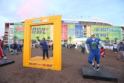 Before kickoff at Camping World Stadium, fans could take photos inside a large frame and standing behind uniforms of the N.F.C. and A.F.C. players.