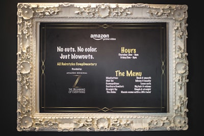 Salon signage was printed with the Amazon Prime Video logo, as well as the black-and-gold logo for the show. Elsewhere, staffers hung framed photos of the series' characters.