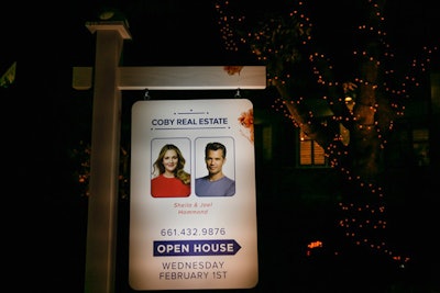 A bloody sign bore the likenesses of the show's married real estate agents.