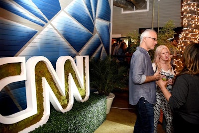 Also at SXSW this year, CNN changed its concept from last year’s CNN Grill to this year’s CNN Bungalow on Rainey Street, with a residential look and feel, including a moss-filled logo decor piece atop fake hedging in the backyard.