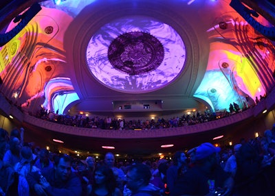 Colorful projections on walls and center dome