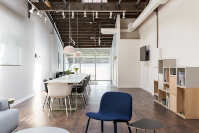 Enlightened View of Lofted Workshop Space