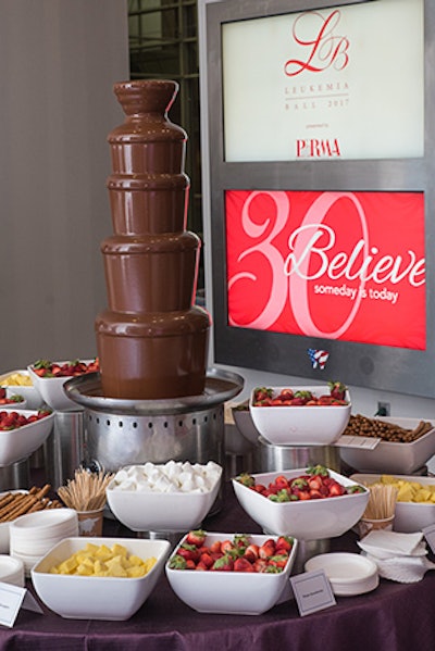 In the valet lounge, the Chocolate Chick set up a chocolate fountain with marshmallows, pineapple chunks, strawberries, and pretzel sticks for dipping.