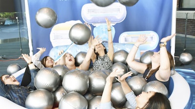 This interactive photo op he a camera directly overhead of the inflatable pool.