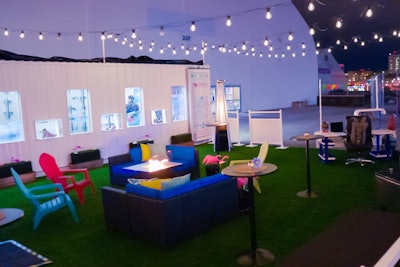 Zappos has designed the activations to have the feel of a backyard party, with casual furniture, artificial turf, and string lights.