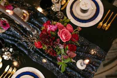 A navy table runner and satin napkins from Luxe Linens nodded to hints of the prince’s blue tuxedo.
