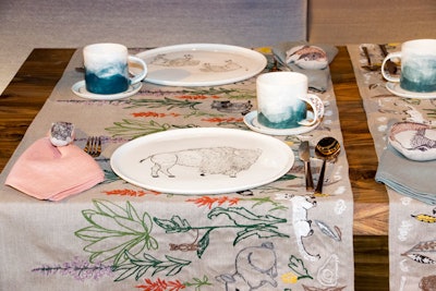 Coral & Tusk's table runners were embroidered on Sunbrella fabric with hand-drawn illustrations of wildflowers and animals native to the plains.