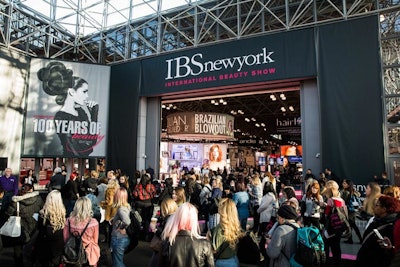 Signage outside the show's main entrance and throughout the show floor recognized the event's 100th anniversary.