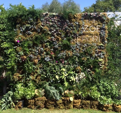 At the Zoe Report and Dolce Vita pool party, held at the dFm House during Coachella in 2015, a dimensional succulent wall with a Zoe Report logo served as a photo backdrop in the entrance area.