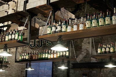 Visitors receive a complimentary drink at JJ’s Bar on the premises.