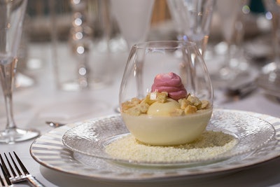 The meal ended with a traditional Italian dessert, white chocolate panna cotta, served with limoncello cremoso, raspberry foam, and biscotti crumble.