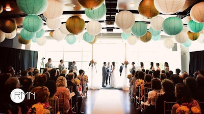 Wedding ceremony with lanterns in Buchanan Room