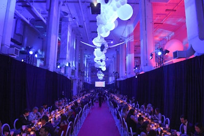 Dining tables lined the mock runway.