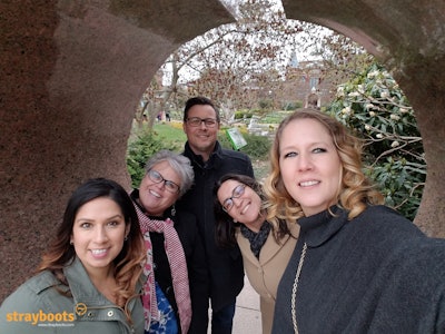A team find a hidden spot at the Smithsonian Museums scavenger hunt in Washington DC.