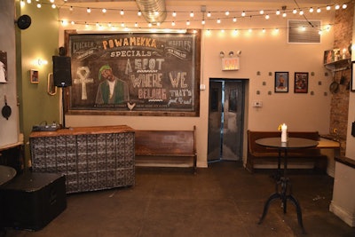The interior featured decor including music memorabilia from Shakur's favorite artists, personal photos from his childhood, and a chalkboard that included an illustration of the rapper and one of his iconic song lyrics.