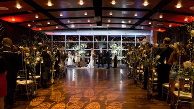 Evening wedding ceremony in Buchanan Room