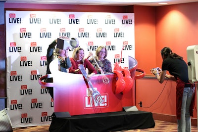 Oversize kitchen tools served as fun props in the event’s photo booth.