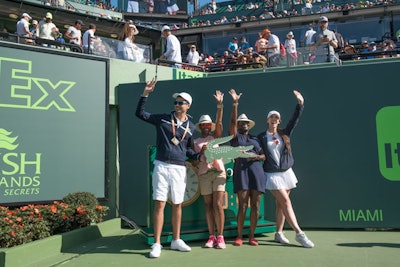 Seat upgrades were awarded in a campaign called 'Spot the Croc,' playing off Lacoste's reptile logo. Winners were recognized on the court.