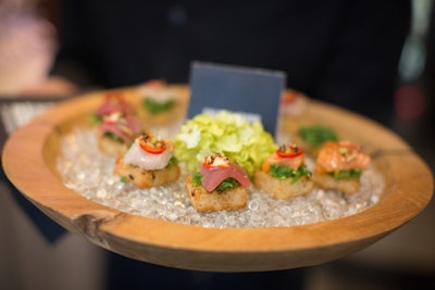 Among the passed hors d’oeuvres from chef Chai Trivedi were salmon crudo and hamachi crudo.