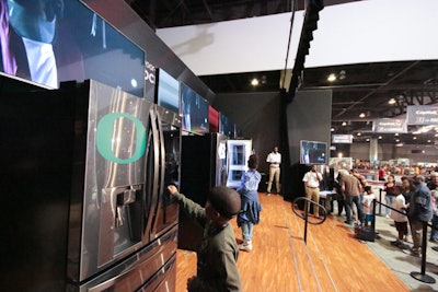 In the Let’s Make a Deal-style game, LG demonstrated its new InstaView refrigerators, which have a glass window on the door that illuminates when touched. Fans could opt to turn in their LG lanyard for a chance to knock on the refrigerator door and reveal a prize inside, which ranged from water bottles and sunglasses to big items such as TVs.