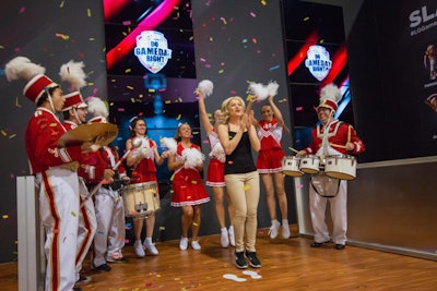 Each of the four days, LG created what appeared to be a spontaneous celebration, complete with a marching band and cheerleaders, to award one random fan a new TV.