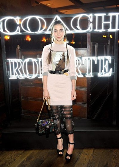 Coach and Rodarte celebrated their collaboration on March 30 at Musso & Frank in Los Angeles. There, neon signage in graphic white announced the two brands' names.