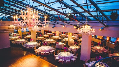 Dinner reception with dance floor and up-lighting.