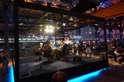 The “Aquarium” was a glass-enclosed booth where organizers conducted live-streamed interviews with speakers and guests.