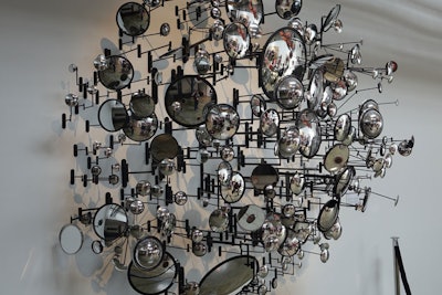 Even decorative elements had a purpose. For example, mirrors were used in a variety of ways, and one was warped and fragmented, a reminder to break current perspectives, find different viewpoints, and look inward while looking forward.