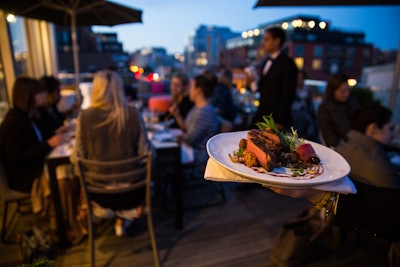 As a nod to summer meals from the grill, Design Cuisine served charcoal grilled Angus New York strip with tricolor fingerlings, chanterelle and lobster mushrooms, french bean salad, and frisee confit tomato.