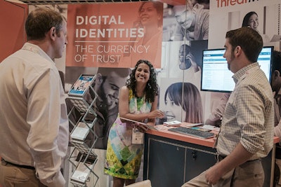 The 30,000-square-foot exhibition space houses the 100 exhibitors, small lounges, and the event's dining area. Air walls around the room have doors that lead to the rooms being used for the 41 conference sessions.