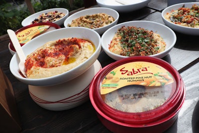 The event offered guests a variety of custom hummus dip creations, with unique toppings such as pistachios and balsamic glaze.