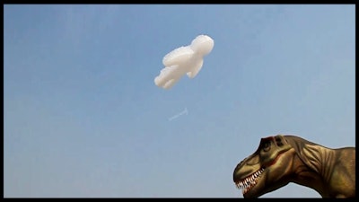 Floating Man Cloud Escapes Dinosaur at Theme Park