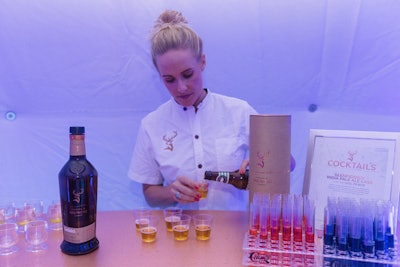 Attendees were encouraged to participate in sensory stations set up in the dome. There were test tubes with colored whiskey to help participants understand the importance of color to taste, as well as vapor stations where guests were able to smell whiskey.
