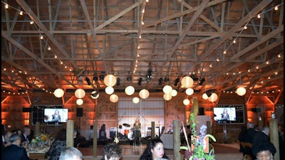 Healthcare fundraising dinner in a barn.