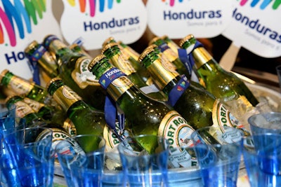 Countries that included a beverage with their dish had the opportunity to earn bonus points based on their pairing. Honduras served its local Port Royal beer with enchiladas with habanero sauce.