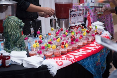 Singapore got involved for the first time this year, opting to take part in the Sips and Sweets lounge by serving a Singapore Sling blending gin, cherry liqueur, DOM Benedictine, Cointreau, bitters, and grenadine with lime and pineapple juices.