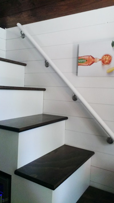 Steps connecting the first and second floors of the tiny house, which provided built-in storage, were decked out with an artsy picture of Nestea, reinforcing the brand.