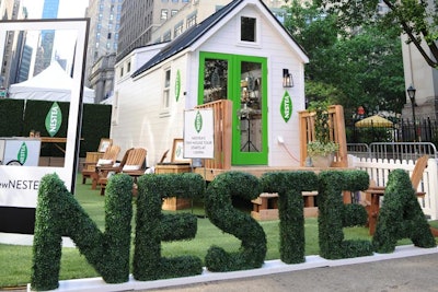 Visitors were greeted by a sign made of grass spelling out the drink-maker's name.