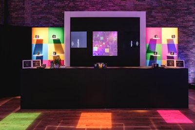 The ground-floor bar featured a geometric square backdrop in vibrant colors.
