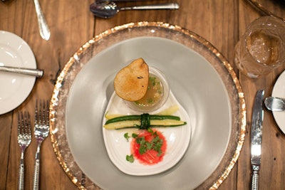 The first course of the Food for Thought luncheon was pear vanilla gazpacho, feta watermelon ravioli, and chive-wrapped yellow and green beans from chef Marcel Martinez of Savor Catering. It was presented on tableware by Events on the Loose.
