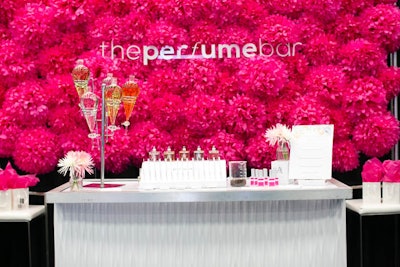The Perfume Bar created a multisensory display at its booth with scents as well as bright florals.