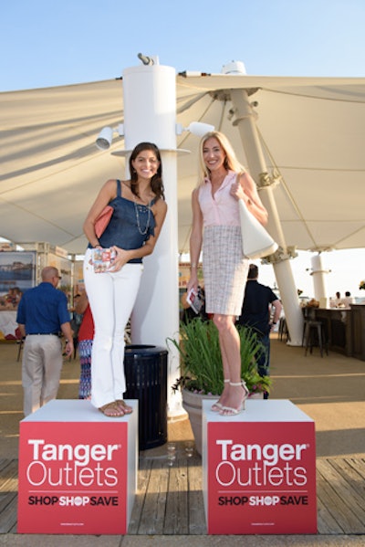 Models from the Tanger Outlets promoted the mall’s shopping event taking place that evening, which included bus service to the mall on the other side of the National Harbor property, champagne cocktails upon arrival, and more than $250 in discounts from retailers at the facility.