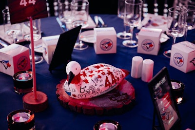 Centerpieces for the seated dinner included wooden loons, which were decorated by kids from the program as part of an art project. 'The project for them was to design the centerpieces with the look and feel of what Canada and baseball means to them,' said Jenny Le, manager of events for the Jays Care Foundation. 'They were decorated by kids ages 6 to 12.'
