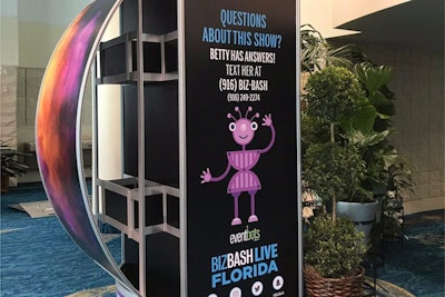 Signs around BizBash Live: Florida provided instructions on how to use the chatbot, dubbed 'Betty.' The bot received more than 1,600 questions regarding the one-day event.