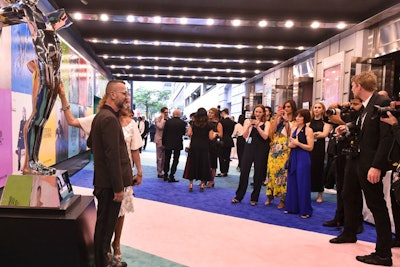 The custom-dyed carpet, in shades of pinks, greens and blues, was rolled straight into Hammerstein Ballroom, creating a unifying effect for guests that read as being seamless. 'We approached the awards design with big, broad strokes,' said Beckman. 'When you got out of your car to entering the venue it was all one big party that didn't feel segmented.'