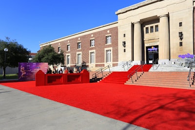 The sweeping red carpet and check-in area suggested the inside-the-body motif that would continue throughout the event.